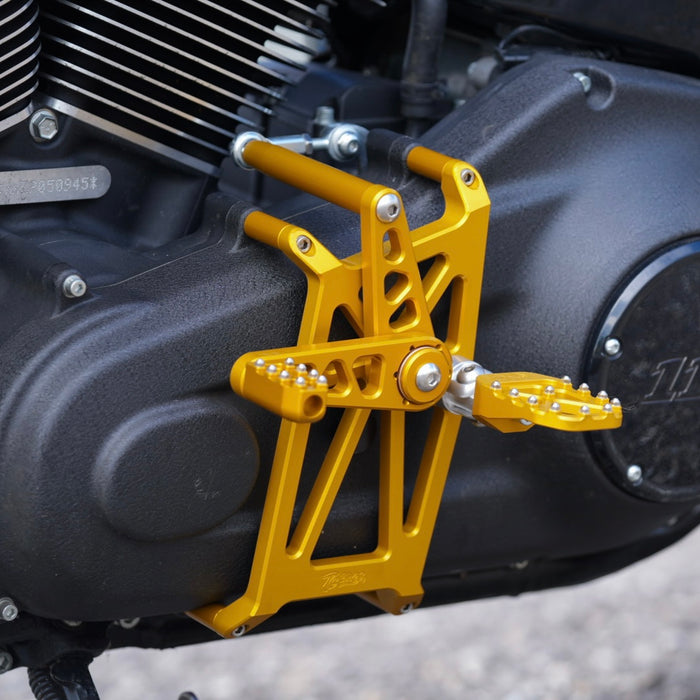 Honda cbr600rr with TC Bros. Pro Series Mid Controls, designed for maximum lean angle on the Harley Davidson Softail, are replaced by TC Bros. Pro Series Mid Controls fits 2018-newer M8 Softail Gold from the brand TC Bros.