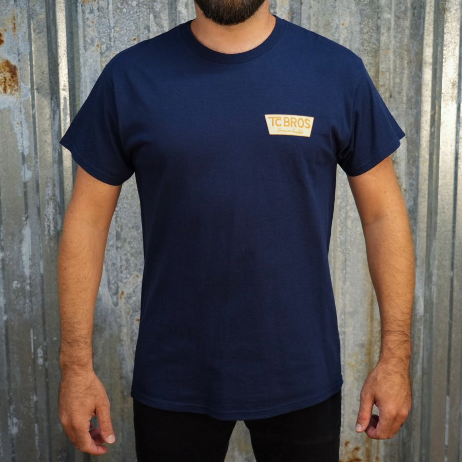 Genuine Quality - Navy Tee with a small TC Bros logo on the left chest area, made of ring-spun cotton.