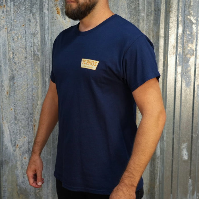 Genuine Quality - Navy Tee with a small TC Bros logo on the left chest area, made of ring-spun cotton.