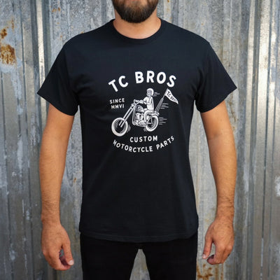 TC Bros. Rider - Black Tee with a vintage motorcycle print and the text "tc bros, since MMVI, custom motorcycle parts", crafted from ring-spun cotton.