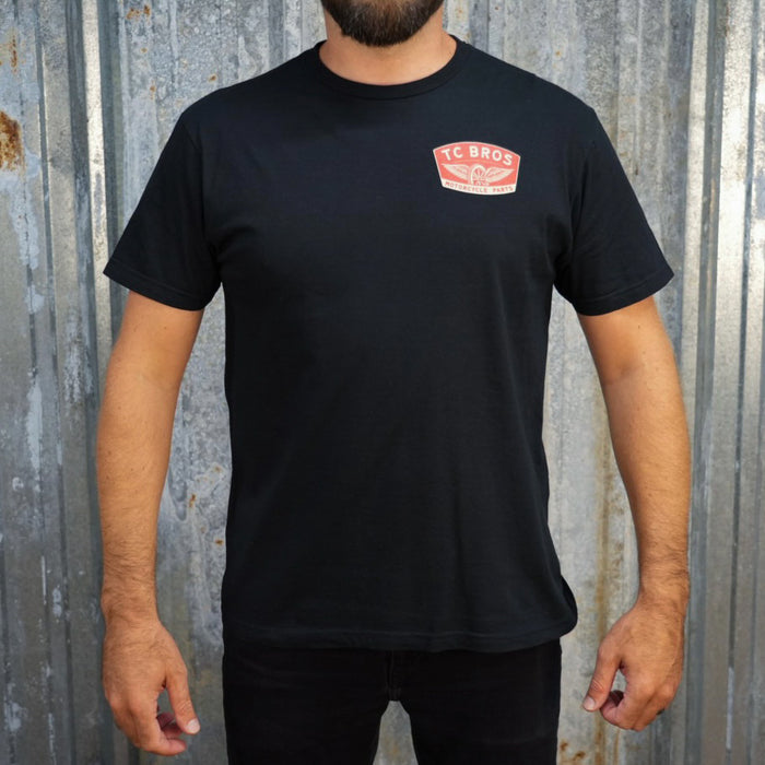 Winged Wheel - Black Tee - (Front Print) with a TC Bros logo on the chest, made from ring-spun cotton.