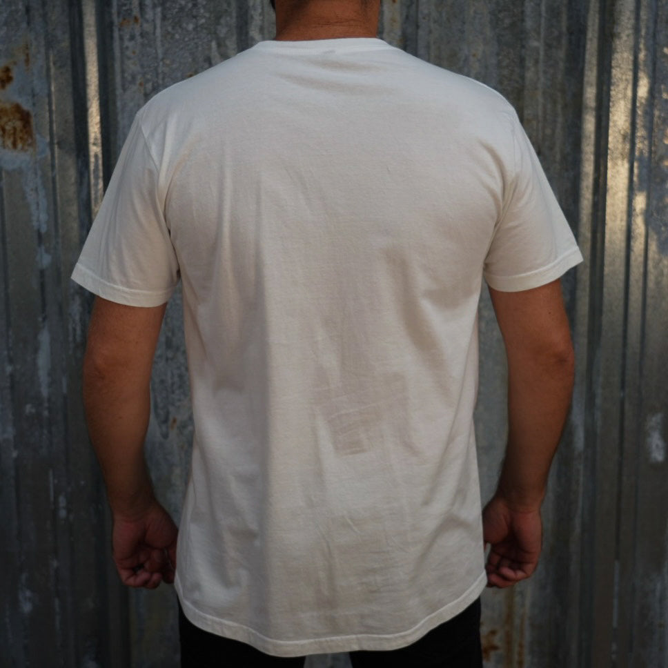 Script - White Tee from TC Bros. with black "70 years" text graphic printed on demand on the upper left chest area.