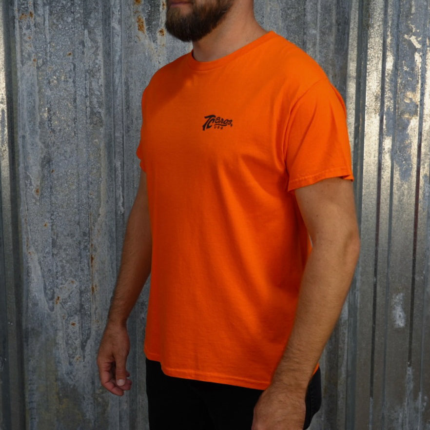 Orange Script - Orange Tee (Front/Back Print) staple t-shirt with a small black logo on the left chest area, printed on demand by TC Bros.