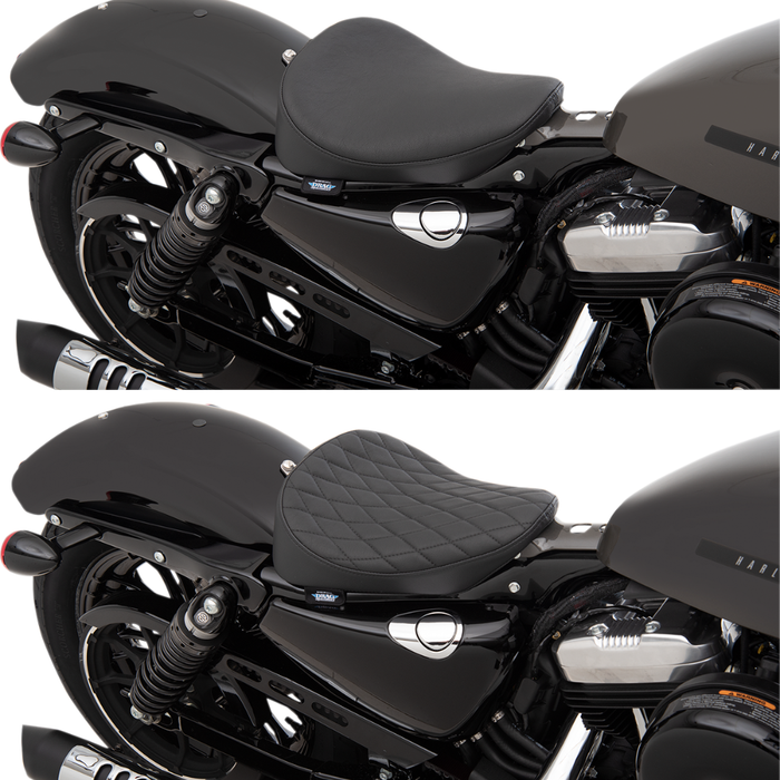 Two motorcycles are displayed side by side; one is a Harley-Davidson Sportster with a smooth leather seat, while the other features a Drag Specialties Bobber Solo Seat for 2010-2022 Harley-Davidson Sportster by Drag Specialties, distinguished by its quilted pattern. Both bikes have black finishes and share similar rear suspension and exhaust systems.