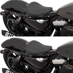 Two motorcycles are displayed side by side; one is a Harley-Davidson Sportster with a smooth leather seat, while the other features a Drag Specialties Bobber Solo Seat for 2010-2022 Harley-Davidson Sportster by Drag Specialties, distinguished by its quilted pattern. Both bikes have black finishes and share similar rear suspension and exhaust systems.