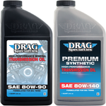 Two bottles of Drag Specialties Transmission Oil for Harley-Davidson from Drag Specialties, including one SAE 80W-90 mineral oil and one SAE 80W-140 premium synthetic transmission oil, both formulated specifically for high-performance Big Twin transmissions.