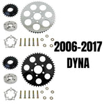 Two TC Bros. Belt-to-Chain Conversion Kits for Harley-Davidson Dyna 2006-2017, each with sprockets, bolts, and washers—one chrome and one black finish.