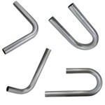TC Bros. Mandrel Bent Elbows for Custom Exhaust—set of four metal pipes, each bent at different angles, perfect for Harley-Davidson exhaust upgrades or custom projects.