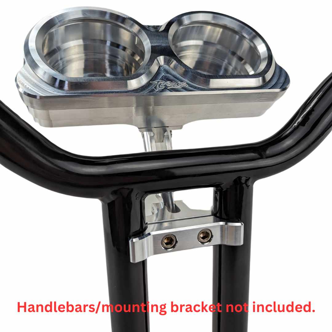 Placed side by side, two billet aluminum components from the TC Bros. Pro Series Gauge Relocation Bezel for Harley Davidson Road Glide feature circular cutouts; one boasts a dark color while the other has a shiny, reflective finish. These bezels from TC Bros. exemplify both style and precision.