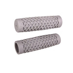 ODI Vans and Cult Grips for 1" handlebars feature a waffle pattern and come in black, brown, maroon, and orange. Textured rubber grips inspired by the Vans x CULT design are arranged on a white surface.