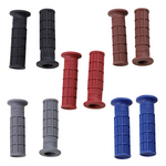Nine pairs of ODI Hart-Luck Grips for 1" handlebars in black, brown, gray, red, and blue with a waffle texture are displayed on a white background. Ideal as stylish replacements or upgrades from ODI.