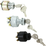 Three Moto Iron® metal ignition switches, including the Moto Iron Universal Ignition Switch, are arranged diagonally on a white background. Each switch displays exposed terminals and comes with attached keys.