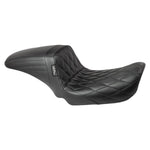 The Le Pera Kickflip Seat - Diamond - Black - FXLR, FXLRS, FXLRST, FLSB '18-'24 from the brand Le Pera features a sleek and stylish design. Crafted from black leather, this seat adds a touch of elegance to any motorcycle. Its diamond pattern adds a unique and luxurious element to the overall look.
