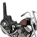 Two black, diamond-stitched TC Bros. King & Queen Hardtail Seats by TC Bros.—one mounted on a partially shown motorcycle—evoke classic Harley-Davidson chopper style.