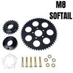 The TC Bros. Belt to Chain Drive Conversion Kit for 2018-Up Harley Davidson M8 Softail includes a large sprocket, small gear, hub, and hardware arranged on a white background—perfect for Milwaukee-Eight-powered models.
