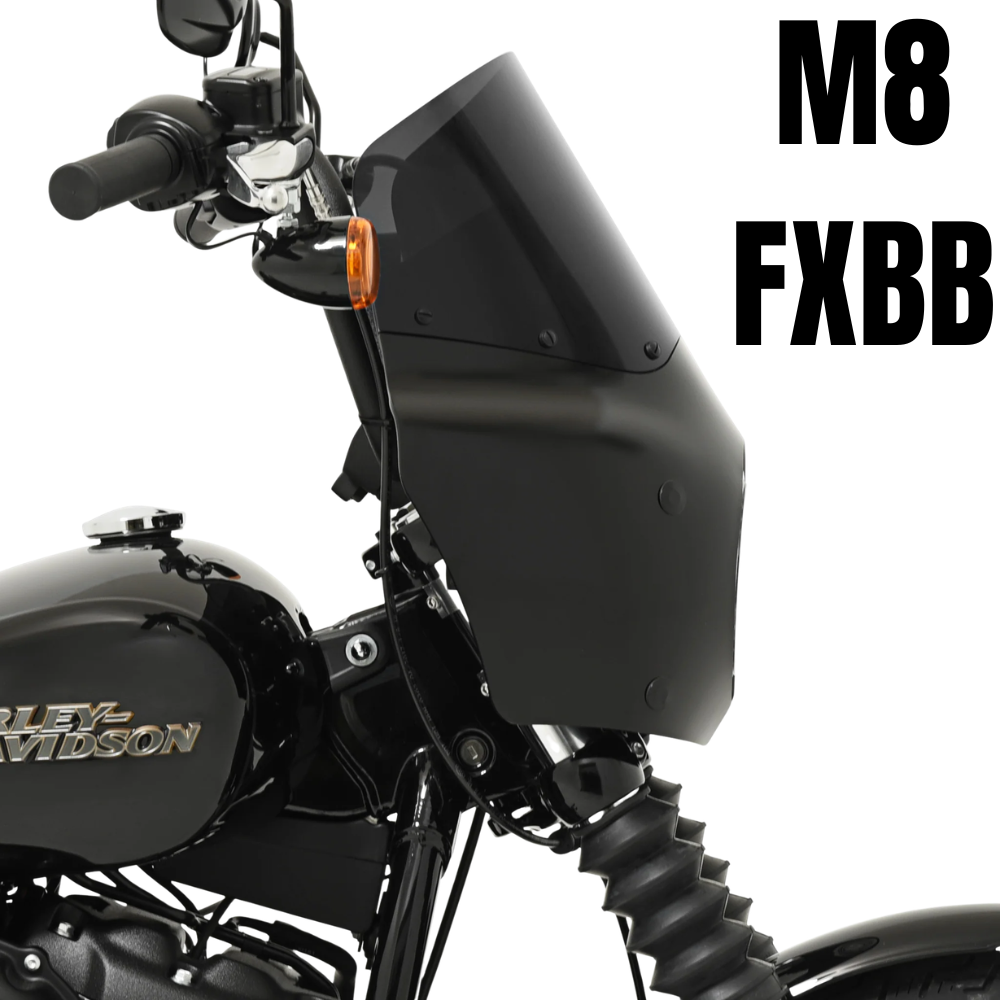 A black 2018-2026 Harley-Davidson Street Bob with a Memphis Shades Road Warrior Fairing in matte black; "M8 FXBB" is boldly displayed on the right.