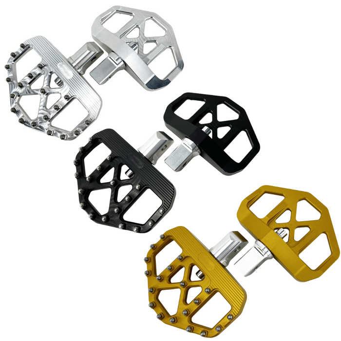 Three pairs of bicycle pedals in silver, black, and gold, each with a metal body, flat surface, and traction pins for grip—offering comfort and control similar to TC Bros. Pro Series MX Mini Floorboards for 2018-Up Harley-Davidson (Passenger Position).