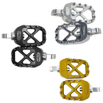 Three pairs of TC Bros. Pro Series MX Footpegs for 1977-2022 Harley-Davidson in silver, black, and gold, each featuring metal pins and a flat, open-frame design inspired by MX foot pegs for superior grip and performance.