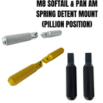 Three pairs of TC Bros. Nomad Passenger Footpegs for Harley-Davidson Softail and Pan America in silver, gold, and black are shown under the text "M8 Harley-Davidson Softail & Pan America Spring Detent Mount (Pillion Position).