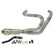 A SP Concepts stainless steel header with multiple bends rests on a gray surface, highlighting its craftsmanship. In the background, an American flag-designed welding mask nods to the customization spirit of Harley Davidson Sportster and Lanesplitter Exhaust fans.