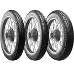 A classic block pattern tire, the Avon Tire - Safety Mileage Mark II AM7 - Rear - 4.00-18 - 64S by Avon, mounted on a spoked wheel.
