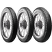 A classic block pattern tire, the Avon Tire - Safety Mileage Mark II AM7 - Rear - 4.00-18 - 64S by Avon, mounted on a spoked wheel.