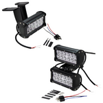 The TC Bros. Scrambler LED Headlight Kit for Harley-Davidson includes two black LED light bars with wiring, connectors, brackets, and hardware—perfect for off-road use or upgrading your Harley's lighting system.