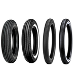 Four vintage-style car tires, including the Shinko 270 Super Classic Tire by Shinko, are displayed upright in a row on a white background, each with unique tread patterns and some featuring classic white sidewalls.