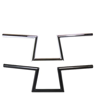 Two TC Bros. 1" Slant Z Handlebars—one chrome, one black—are shown parallel on a white background. Ideal for custom Harley or chopper upgrades, these quality bars are crafted by TC Bros.