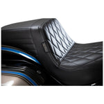 The Le Pera Kickflip Seat - Diamond - Black - FXLR, FXLRS, FXLRST, FLSB '18-'24 from the brand Le Pera features a sleek and stylish design. Crafted from black leather, this seat adds a touch of elegance to any motorcycle. Its diamond pattern adds a unique and luxurious element to the overall look.