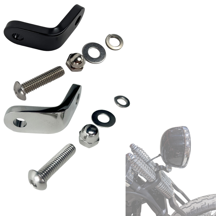 Two TC Bros. Springer Headlight Mounting Brackets with screws, washers, and nuts are shown on a white background. A partial view of a TC Bros. Springer Headlight Mounting Bracket and a motorcycle handlebar mirror appear in the lower right corner.