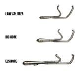 The SP Concepts Big Bore Exhaust for M8 Softail ST & Sport Glide (2018-Present) in stainless steel, featuring welded joints and a hexagonal logo emblem, rests on a metallic work surface, highlighting its premium finish.