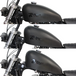 TC Bros. Frisco-Style Gas Tank Lift Kit for Harley-Davidson Sportster 1995-2003, includes two black metal brackets, a black cylindrical spacer, bolt, washer, and nut—shown on a white background.