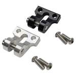 The TC Bros. Gauge Relocation Bracket for Pro Series Truss Risers includes one silver and one black metal clamp with knurled screw mechanisms, plus four screws—perfect for mounting your motorcycle gauge.
