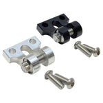 Two TC Bros. Pro Series metal motorcycle chain adjuster blocks, one silver and one black, with matching screws, are displayed on a white background, exemplifying American craftsmanship.