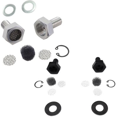 Various metal and plastic hardware, including bolts, washers, mesh screens, retaining rings, and gaskets—such as TC Bros. Breather Bolts for Harley-Davidson Twin Cam—are displayed on a white background.