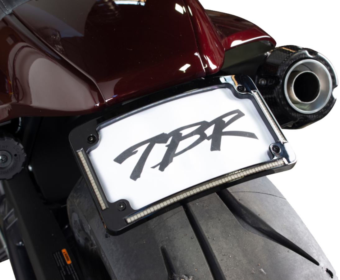 Rear view of a Sportster S motorcycle featuring the Two Bros. Fender Eliminator Kit with integrated license plate light, highlighting its stylish design and prominent "TBR" license plate letters.