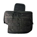 Introducing the Speedwell Cutaway Saddlebags for Harley Sportsters, M8 Softail, and Dyna—an elegant black saddlebag featuring dual compartments with stitched detailing and handles on each side. Expertly designed to straddle over the back of a motorcycle seat, it's the perfect accessory for your ride.