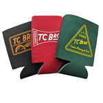 Set of three TC Bros. Can Koozies in black, navy, and beige, each with unique designs inspired by custom motorcycle parts.