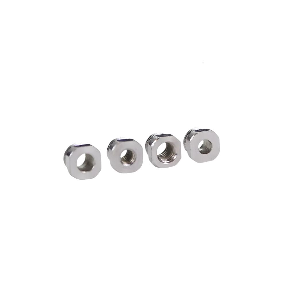 Four small hex nuts, perfect for the Replacement Ferrule Set for TC Bros. HD Throttle adjustments, are neatly aligned on a white background. Ideal for TC Bros. fans aiming to fine-tune their projects with precision.