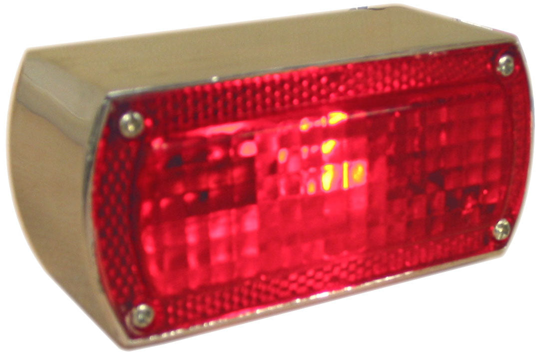 A rectangular red Box Style Chopper Tail Light with a chrome border and exposed black wires for electrical connection, reminiscent of a design by Wyatt Gatling.