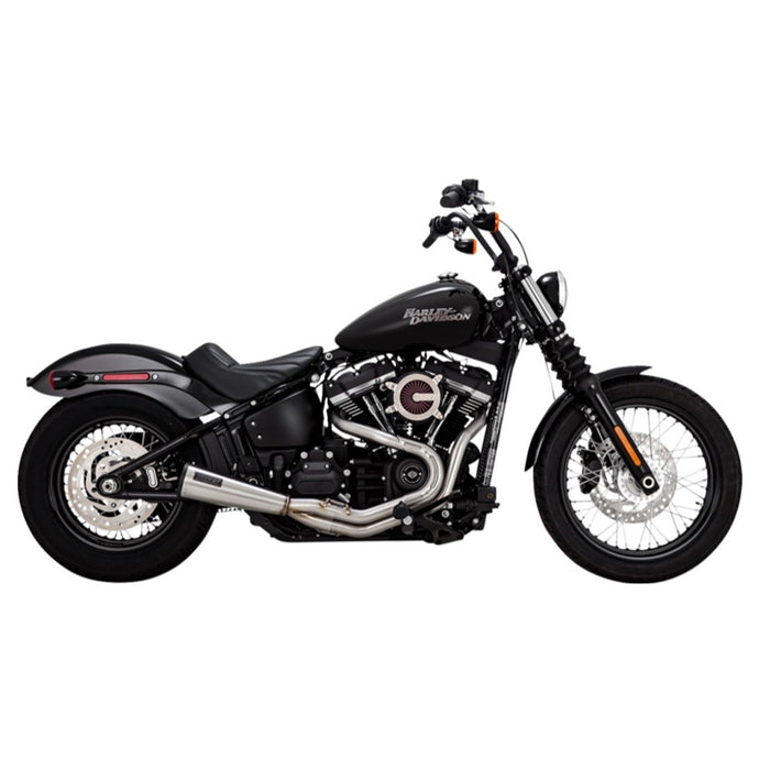 A black motorcycle with a Vance & Hines Stainless Steel 2-into-1 Upsweep M8 soft tail exhaust on a white background.