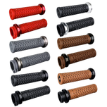 A pair of black, textured ODI Lock-On V-Twin Grips For Harley - Cable Throttle - bike handlebar grips with end caps.