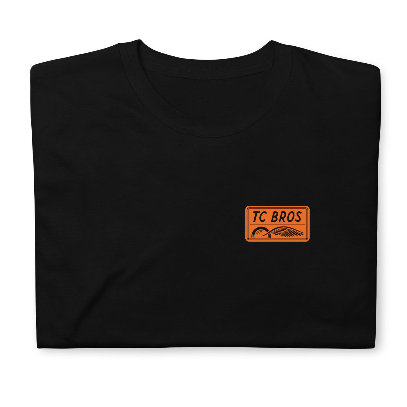 Badge - Black Tee, ring-spun cotton, with a small TC Bros. logo on the left chest area.