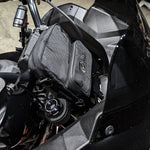 A TC Bros. Motorcycle Handlebar Bag attached to a motorcycle, for carrying riding essentials.
