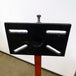 A Yamaha motorcycle engine is securely mounted on a Chop Source Deluxe Yamaha XS650 Engine Stand Brackets by Chop Source, positioned against a plain white wall.