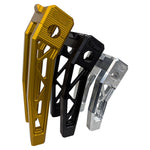 Three TC Bros. Pro Series Truss Digital Gauge Pullback Risers for Harley-Davidson Softail (2018-2024) in gold, black, and silver are upright against a white background, showcasing their durable style.