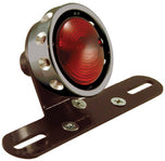 A Mid-USA Black Vintage Drilled Tail Light with wires attached to it.