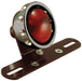 A Mid-USA Black Vintage Drilled Tail Light with wires attached to it.