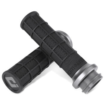 The Waffle Lock-On V-Twin Grips for Harley - Cable Throttle in Black/Graphite by ODI feature a textured pattern, providing both style and functionality.